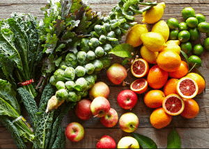 a group of fruits and vegetables on a wood surface Healthy Weight Loss Diets Prestwich